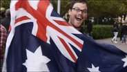 Ein Fan mit australischer Flagge  