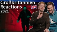 Mikkel Robrahn und Gunnar Krupp mit dem britischen Sänger James Newman.  