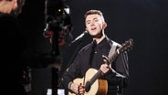 Ryan O'Shaughnessy auf der Bühne in Lissabon. © eurovision.tv Foto: Andres Putting