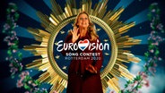 Barbara Schöneberger steht hinter dem Logo des Eurovision Song Contest 2020 in Rotterdam.  Foto: NDR