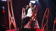Mélovin auf der Bühne in Lissabon. © eurovision.tv Foto: Andres Putting