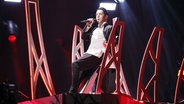 Mélovin auf der Bühne in Lissabon. © eurovision.tv Foto: Andres Putting