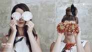 Die Band Joco mit Muscheln und Blumen vor ihren Gesichtern © NDR/Screenshot 