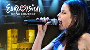 Lena Meyer-Landrut beim Finale von Unser Star für Oslo. Im Hintergrund Oslo bei Nacht. © Lena; LIcht: ARD, © windmill Fotolia Foto: Lena, Licht: Willi Weber, Oslo: © windmill Fotolia